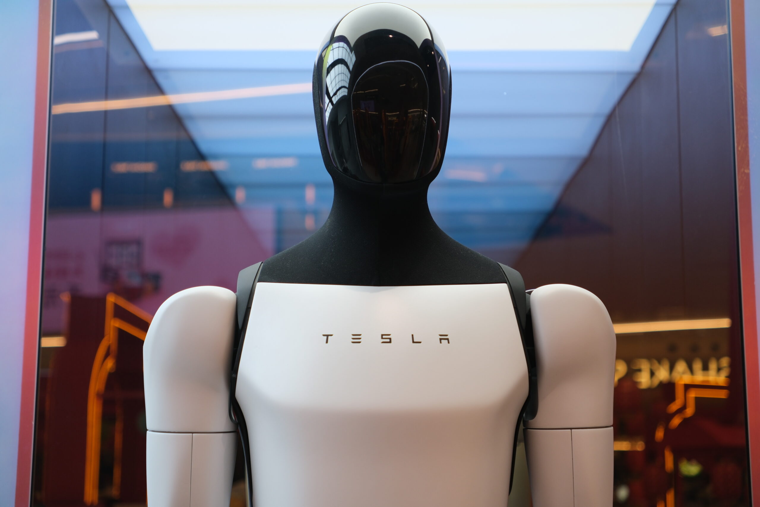 Tesla Optimus Robot Heads to Times Square to Hand Out Candy